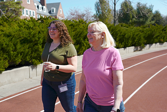 Point32Health employees walking on the on-site track