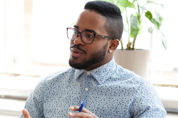 attentive man sitting in a meeting